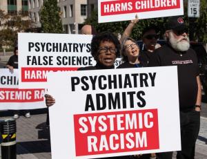 Mental Health Activists Protest Psychiatric Organization’s Systemic Racism and Failure to Follow the Science
